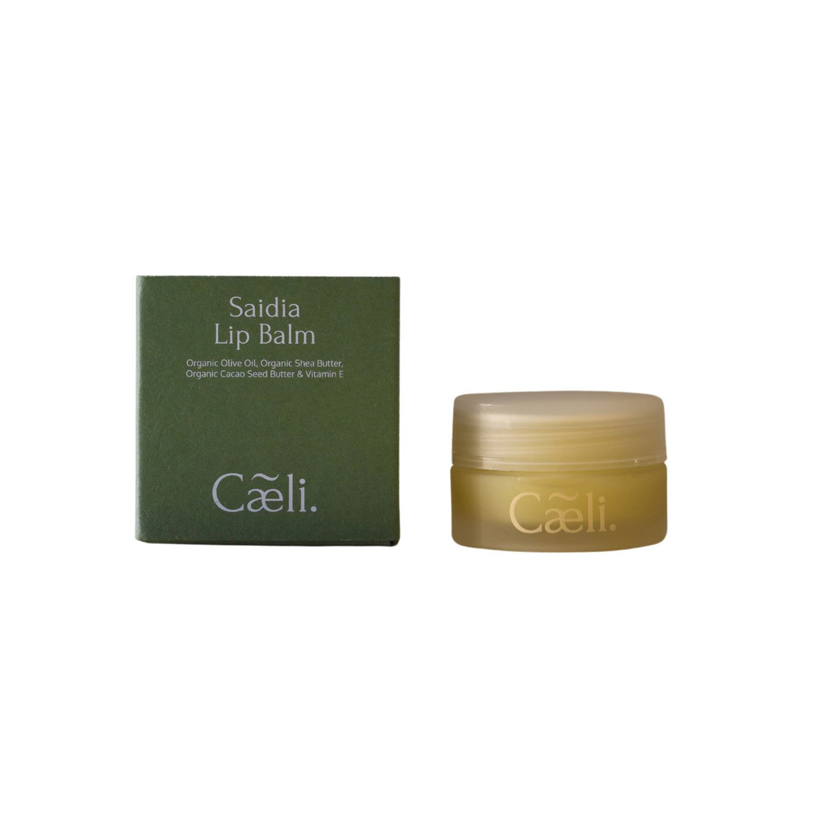 Saidia Lip Balm by Caeli, with organic olive oil and shea butter, shown with its dark olive green outer box and a small translucent amber jar with a frosted lid on a plain white background.