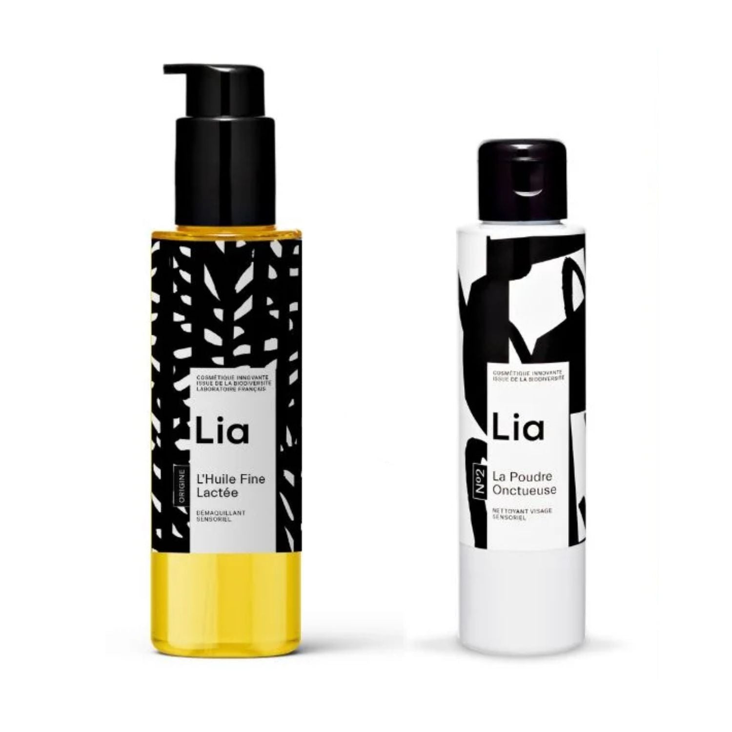 Two cosmetic bottles from the brand Lia on a clean white background. On the left is a clear glass bottle filled with makeup removing oil. On the left is the Cream Powder Gentle Cleanser bottle. 